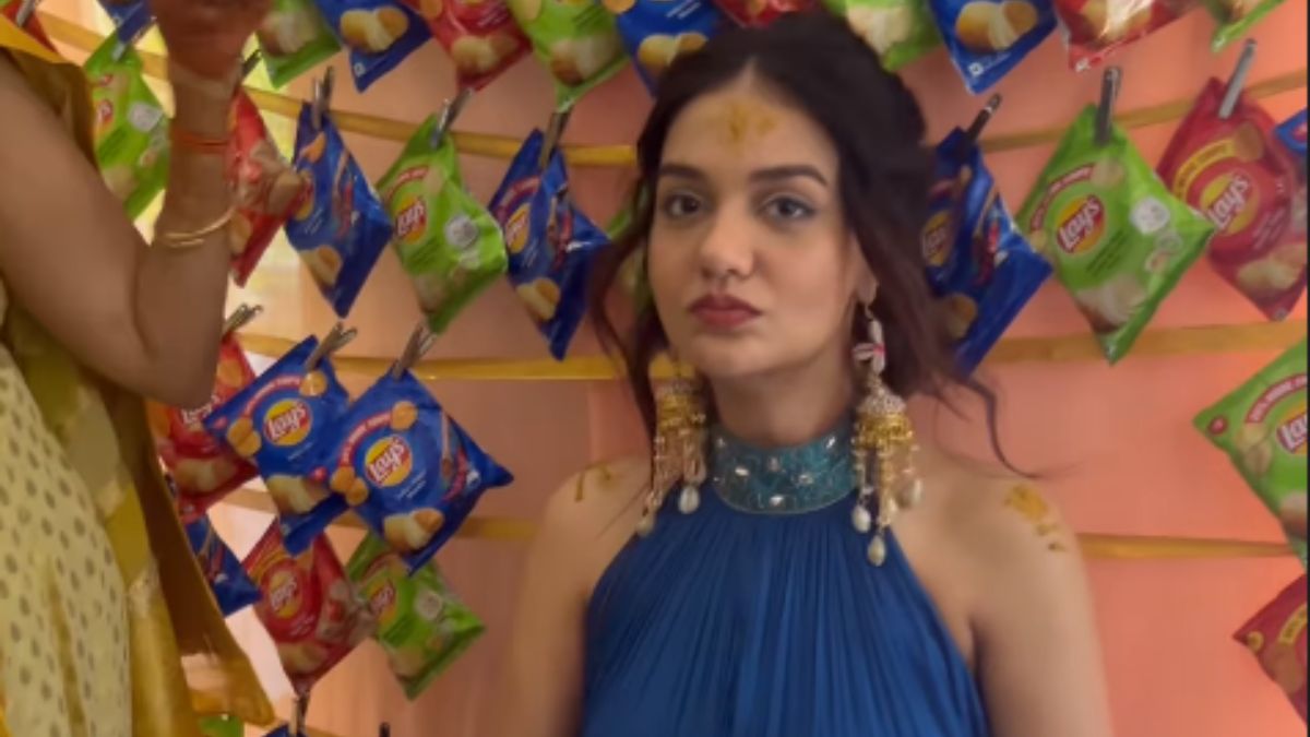 divya-agarwal-haldi-actor-unique-blue-indo-western-outfit-quirky-chips-snacks-decor-apurva-padgaonkar